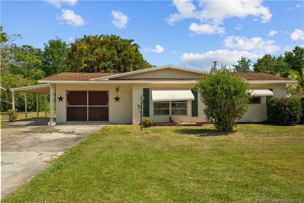 Photo of 2289 NW Sunset Boulevard, Jensen Beach, FL 34957 (MLS # M20044962)