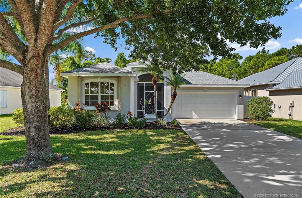 Photo of 2350 NW Tulip Way, Jensen Beach, FL 34957 (MLS # M20049636)