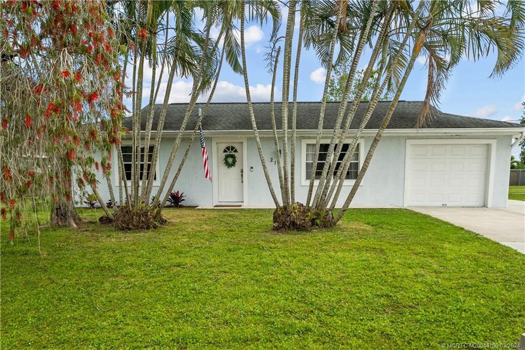 Photo of 2129 SE Holland Street, Port Saint Lucie, FL 34952 (MLS # M20044109)