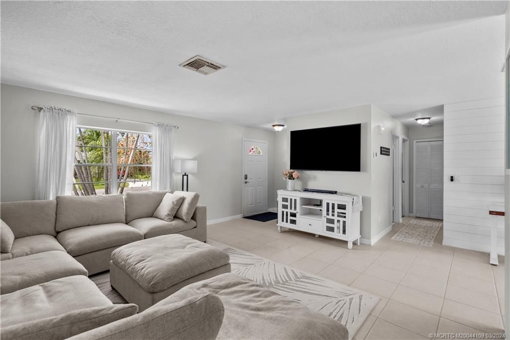 Photo of 2129 SE Holland Street, Port Saint Lucie, FL 34952 (MLS # M20044109)