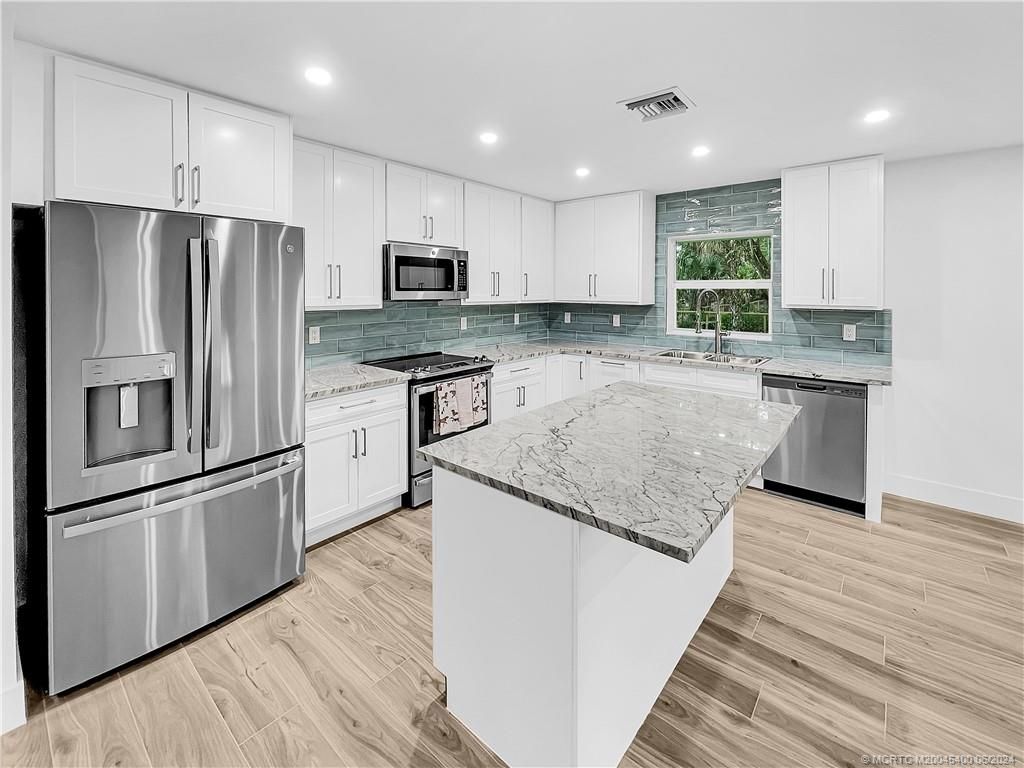 Photo of 2306 SW 96th Street, Stuart, FL 34997 (MLS # M20045400)