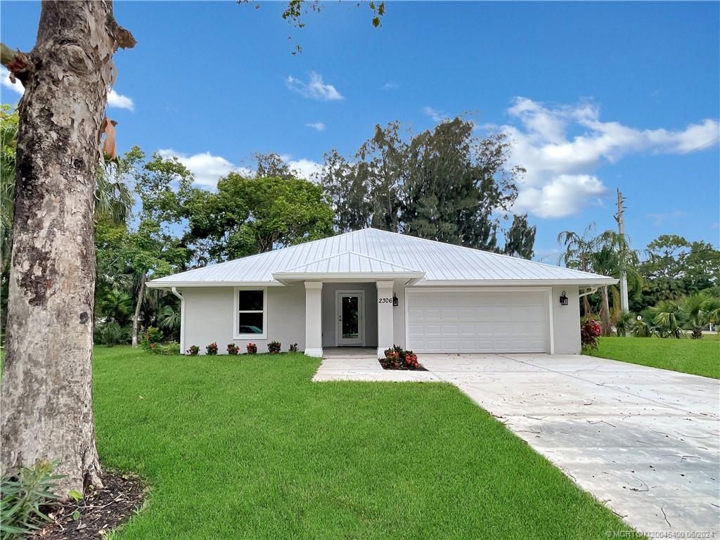 Photo of 2306 SW 96th Street, Stuart, FL 34997 (MLS # M20045400)
