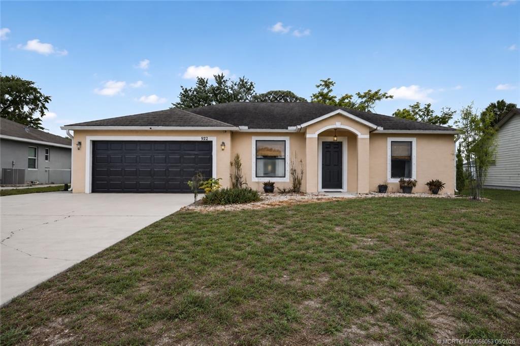 Photo of 922 SW Haleyberry Avenue, Port Saint Lucie, FL 34953 (MLS # M20056053)