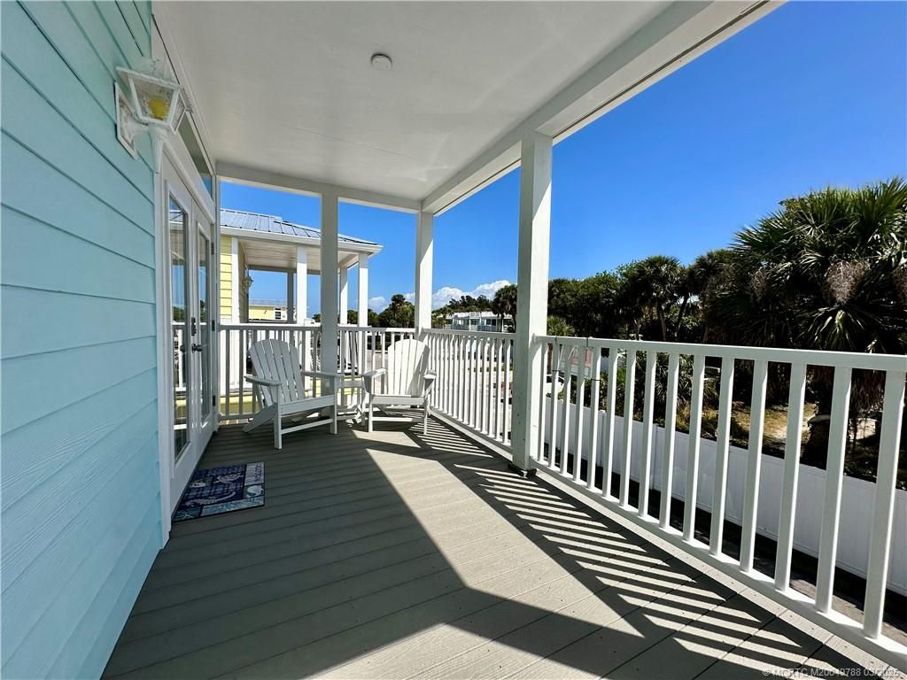 Photo of 297 NE Coastal Way, Jensen Beach, FL 34957 (MLS # M20049788)