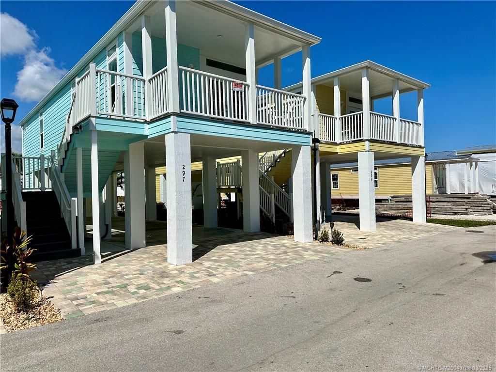 Photo of 297 NE Coastal Way, Jensen Beach, FL 34957 (MLS # M20049788)