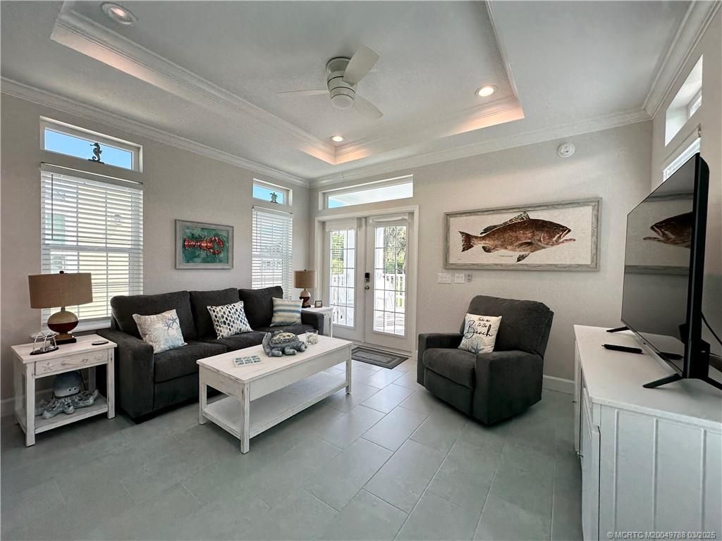 Photo of 297 NE Coastal Way, Jensen Beach, FL 34957 (MLS # M20049788)