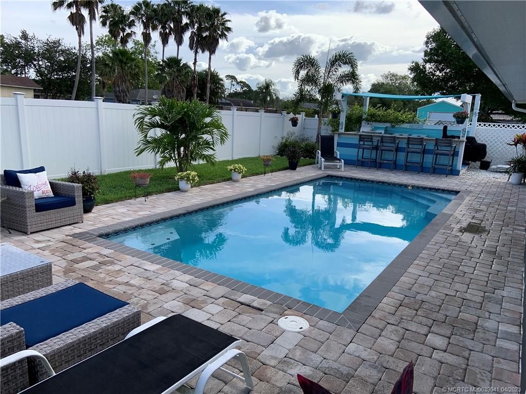 Photo of 1177 SW Gastador Avenue, Port Saint Lucie, FL 34953 (MLS # M20039041)