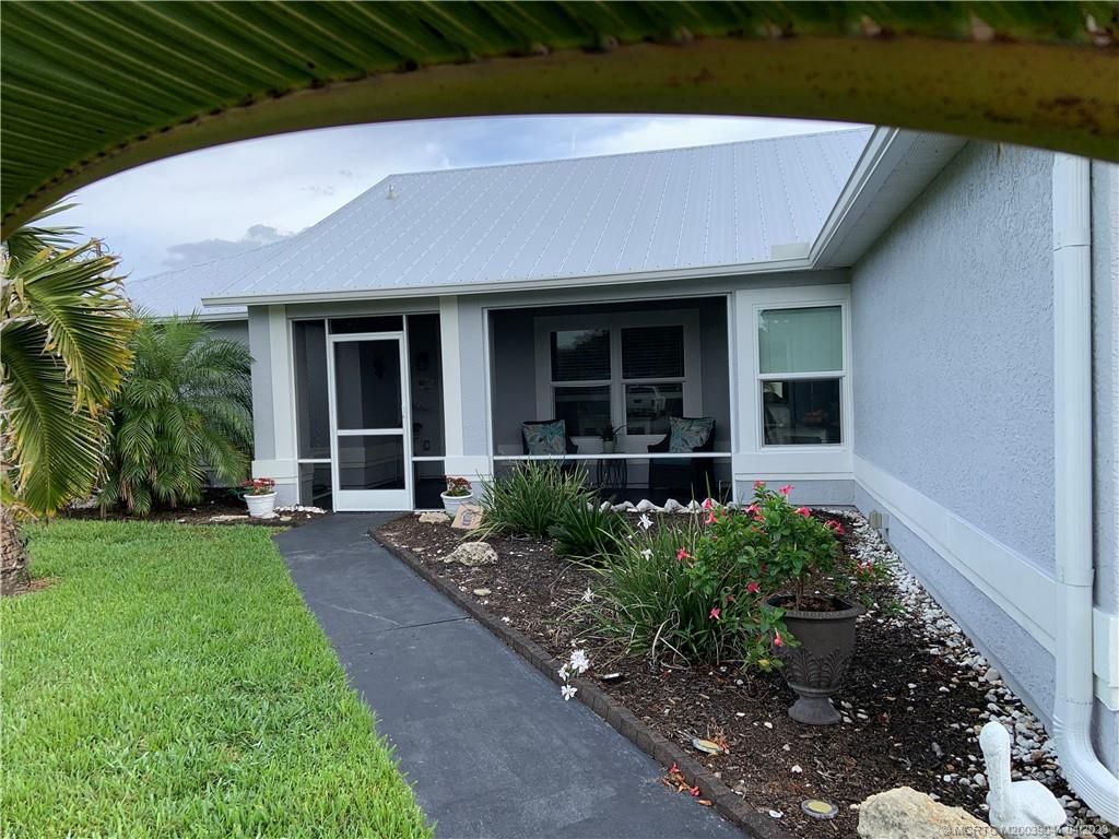 Photo of 1177 SW Gastador Avenue, Port Saint Lucie, FL 34953 (MLS # M20039041)