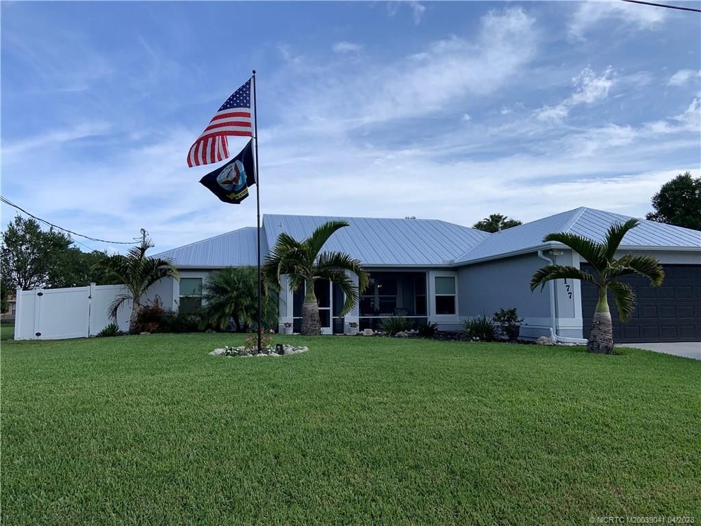 Photo of 1177 SW Gastador Avenue, Port Saint Lucie, FL 34953 (MLS # M20039041)