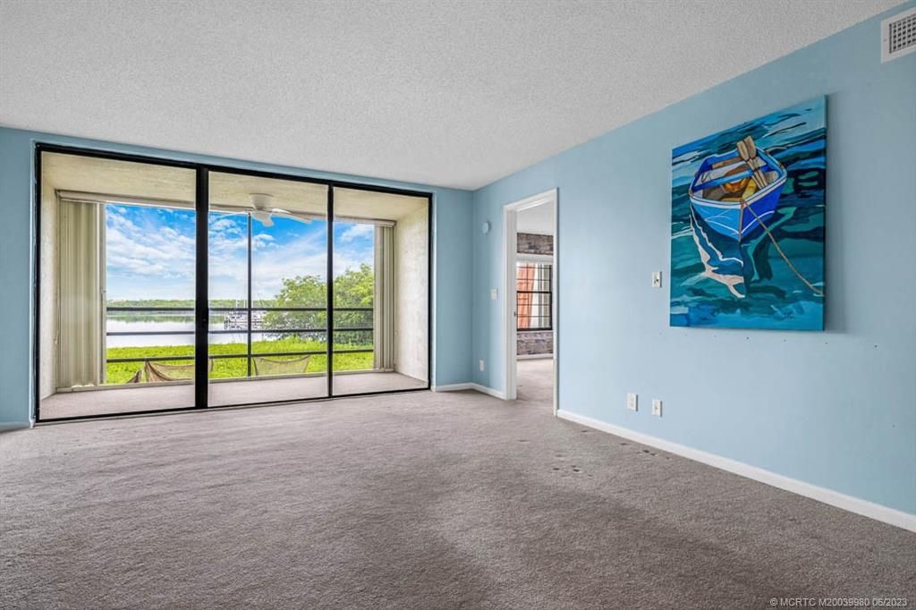 Photo of 3100 SE Pruitt Road #F204, Port Saint Lucie, FL 34952 (MLS # M20039980)