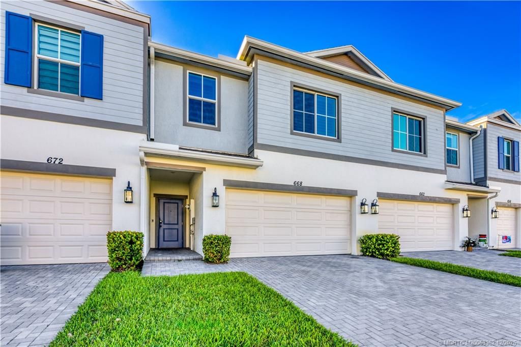 Photo of 668 NE Waters Edge Lane, Port Saint Lucie, FL 34983 (MLS # M20053362)