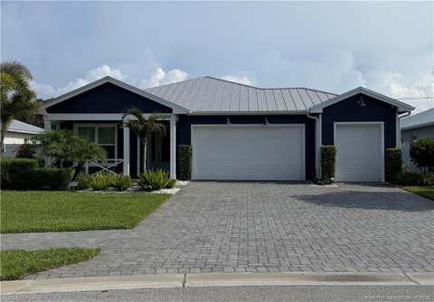 Photo of 1868 SW Pinewood Way, Palm City, FL 34990 (MLS # M20056380)