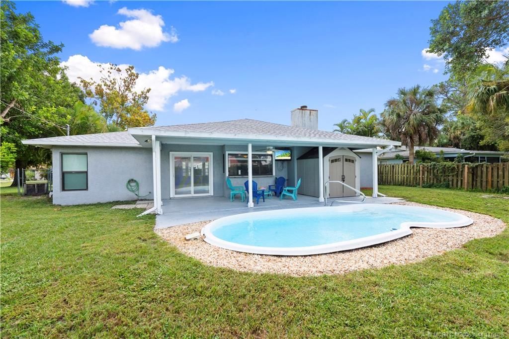 Photo of 2316 SW Lejune Street, Port Saint Lucie, FL 34953 (MLS # M20053044)