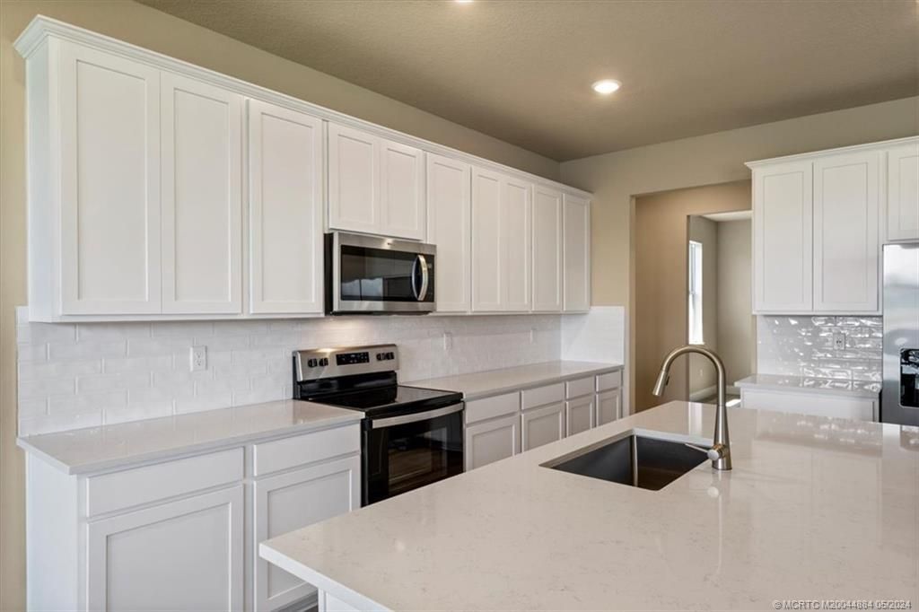 Photo of 6367 NW Sweetwood Drive, Port Saint Lucie, FL 34987 (MLS # M20044884)