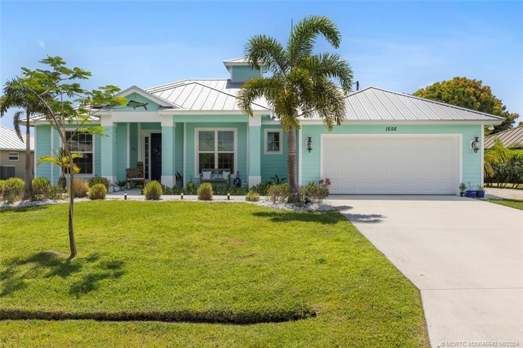 Photo of 1656 SE Dome Circle, Port Saint Lucie, FL 34952 (MLS # M20045542)