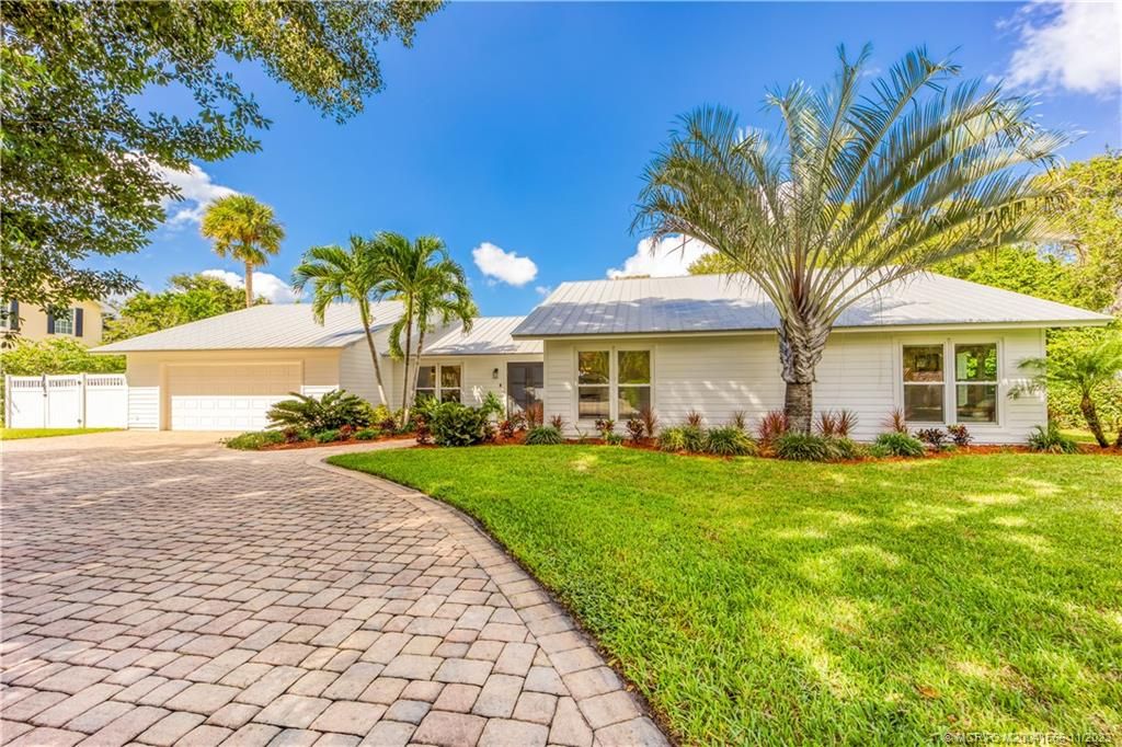 Photo of 10 Ridgeland Drive, Sewalls Point, FL 34996 (MLS # M20041566)