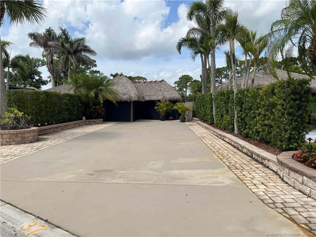 Photo of 37 NW Boundary Drive, Port Saint Lucie, FL 34986 (MLS # M20056357)