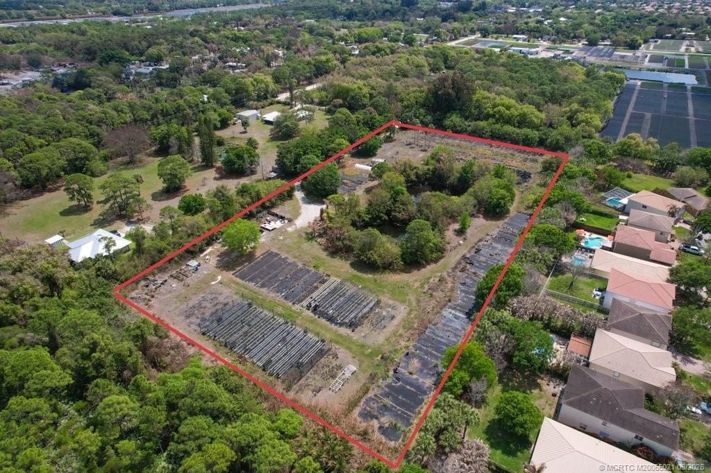 Photo of 1005 SE Ponderosa Road, Stuart, FL 34997 (MLS # M20055021)