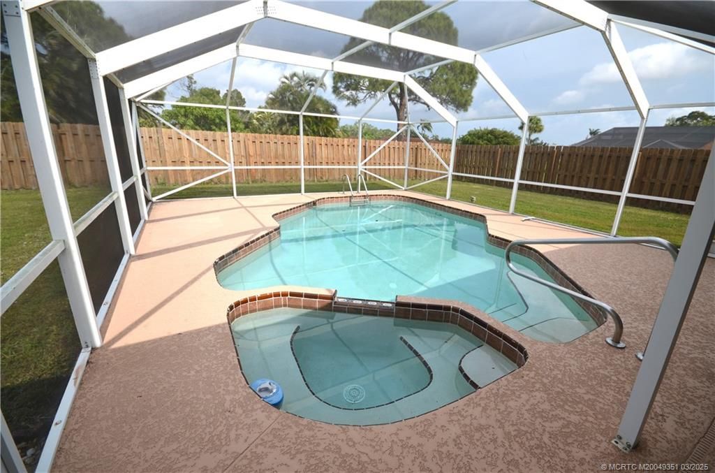 Photo of 1885 SE Westmoreland Boulevard, Port Saint Lucie, FL 34952 (MLS # M20049351)