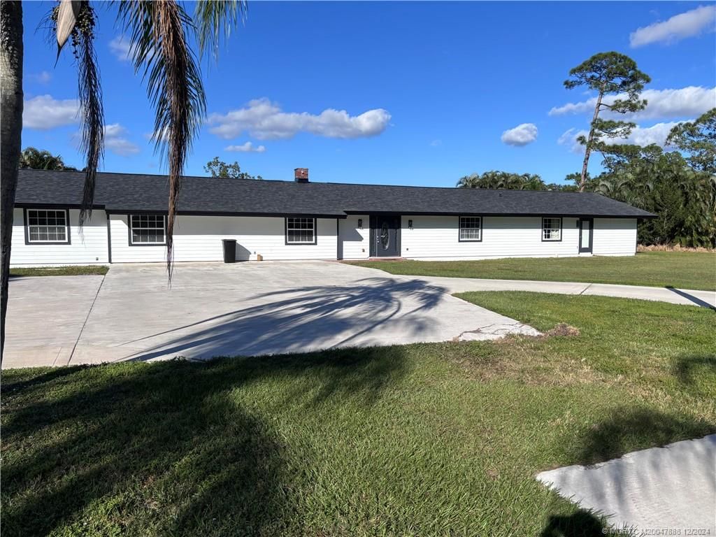 Photo of 6105 SW Gator Trail, Palm City, FL 34990 (MLS # M20047888)