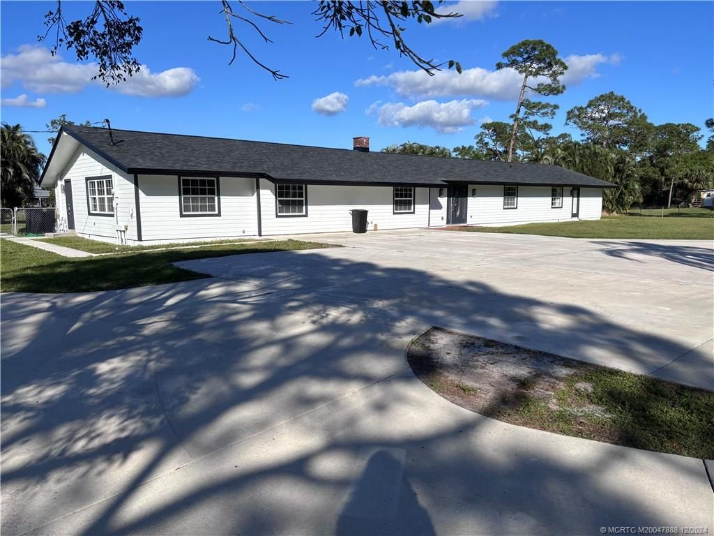 Photo of 6105 SW Gator Trail, Palm City, FL 34990 (MLS # M20047888)