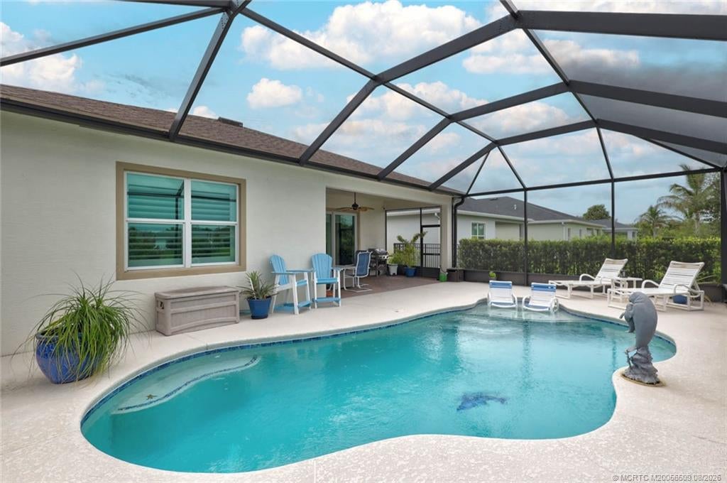 Photo of 742 SE Woodbine Road, Port Saint Lucie, FL 34984 (MLS # M20056509)