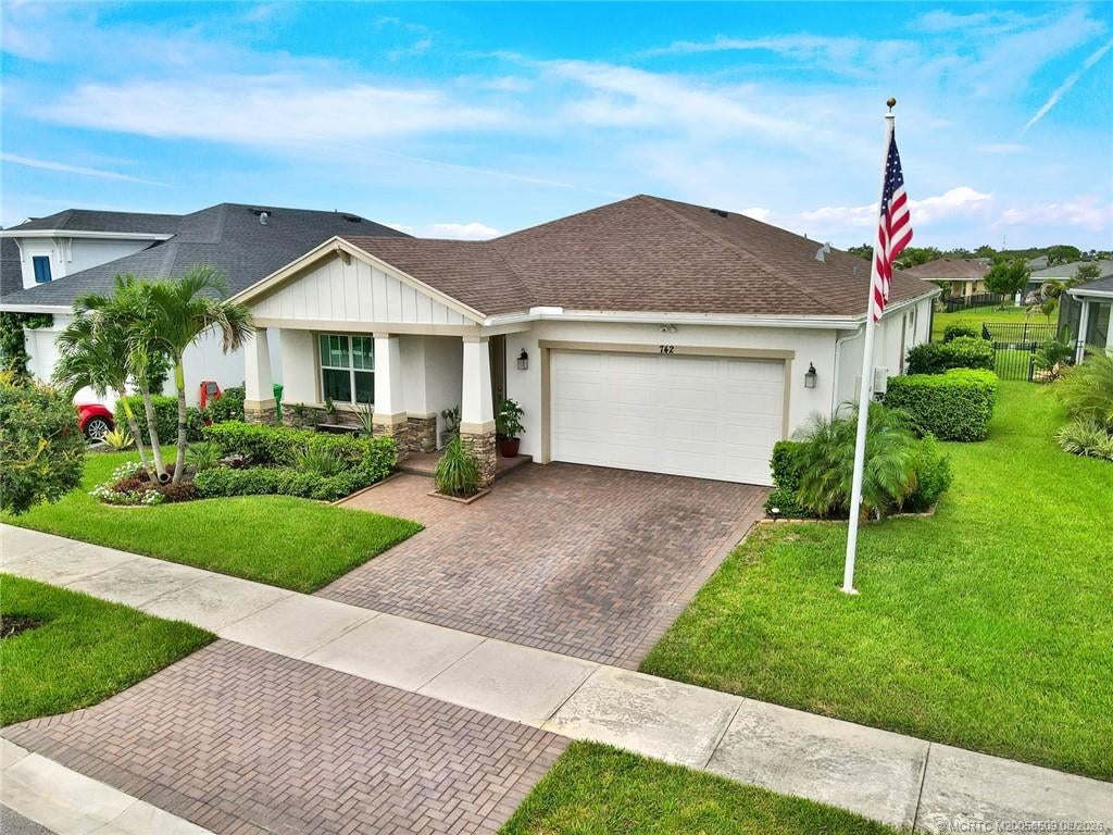 Photo of 742 SE Woodbine Road, Port Saint Lucie, FL 34984 (MLS # M20056509)