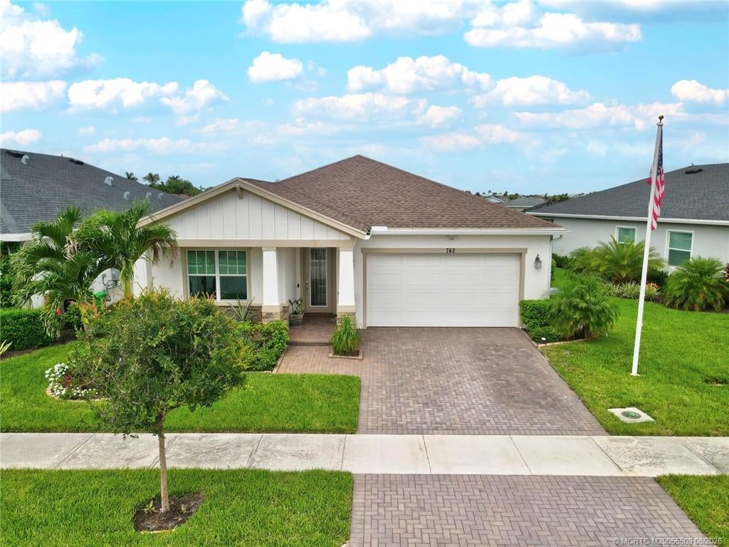 Photo of 742 SE Woodbine Road, Port Saint Lucie, FL 34984 (MLS # M20056509)