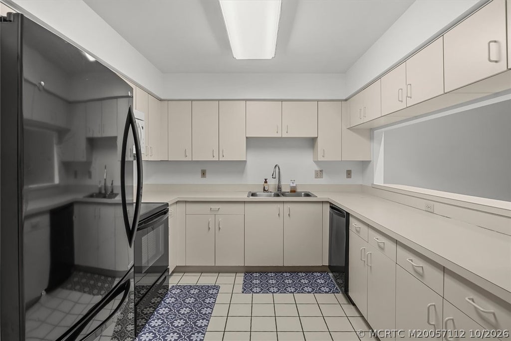 Photo of 663 NE Wax Myrtle Way, Jensen Beach, FL 34957 (MLS # M20057112)