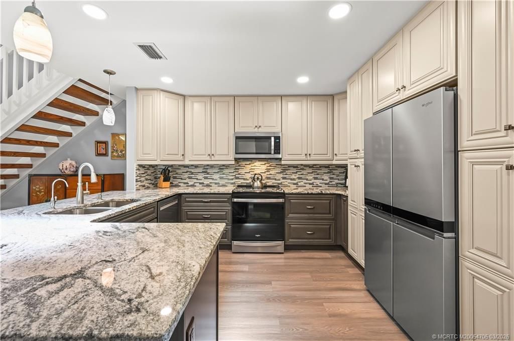 Photo of 3273 NE Holly Creek Drive, Jensen Beach, FL 34957 (MLS # M20054705)