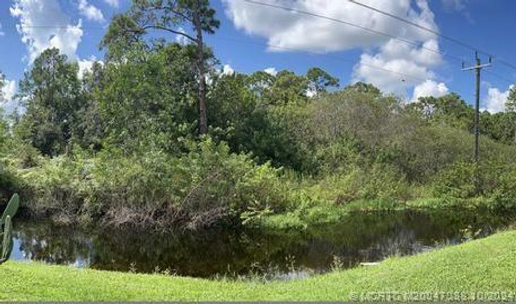 Photo of 16316 SW Indianwodd Circle, Indiantown, FL 34956 (MLS # M20047088)