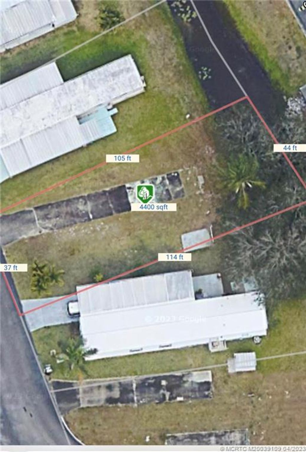 Photo of 338 NE Tropicalia Lane, Jensen Beach, FL 34957 (MLS # M20039109)