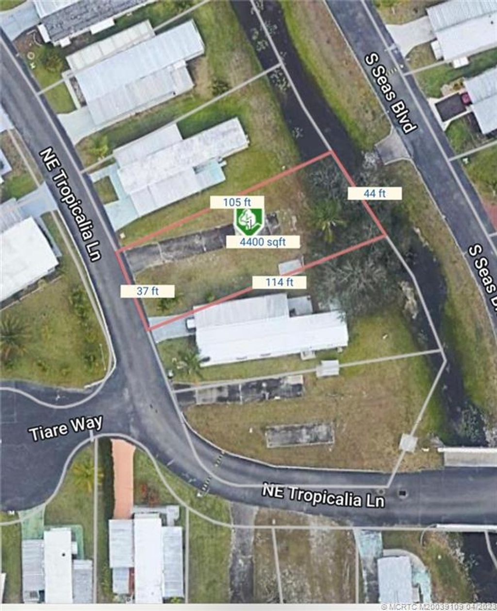 Photo of 338 NE Tropicalia Lane, Jensen Beach, FL 34957 (MLS # M20039109)