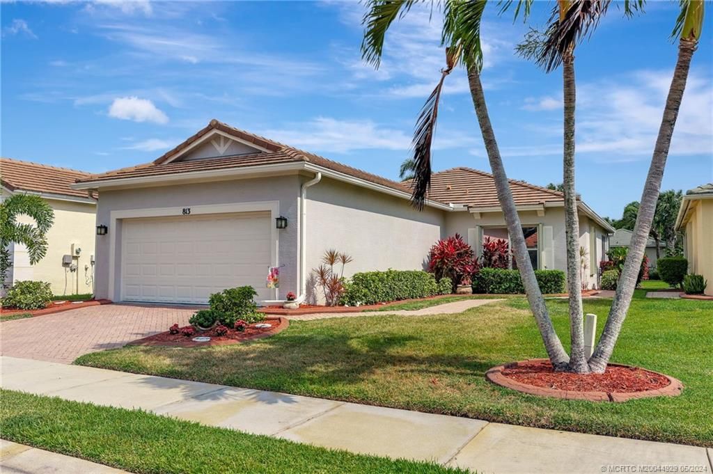 Photo of 813 SW Rocky Bayou Terrace, Port Saint Lucie, FL 34986 (MLS # M20044929)