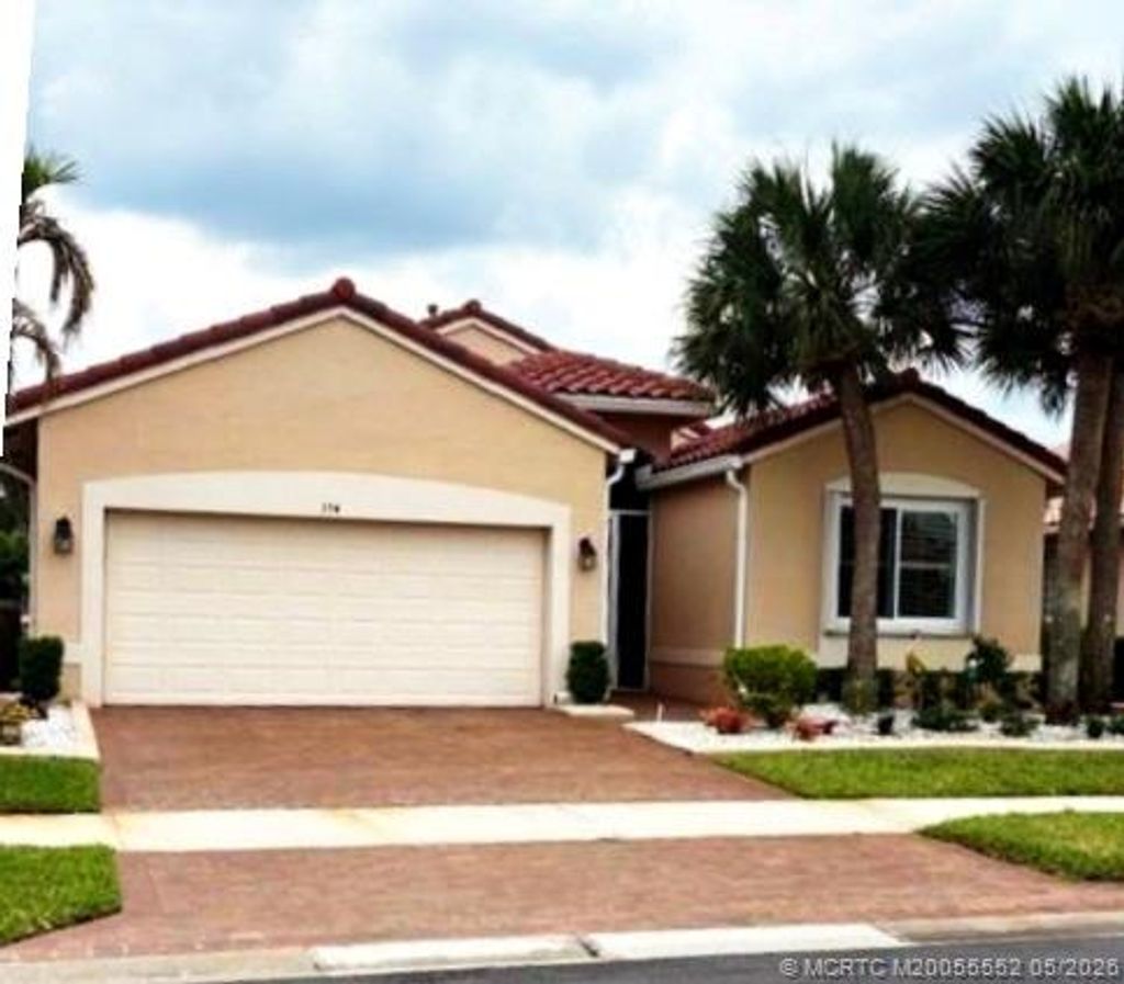 Photo of 394 NW Springview Loop, Port Saint Lucie, FL 34986 (MLS # M20055552)