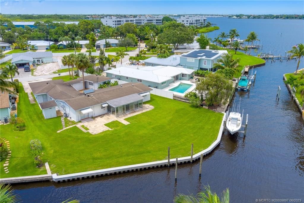 Photo of 1212 SW Pelican Crescent, Palm City, FL 34990 (MLS # M20039897)