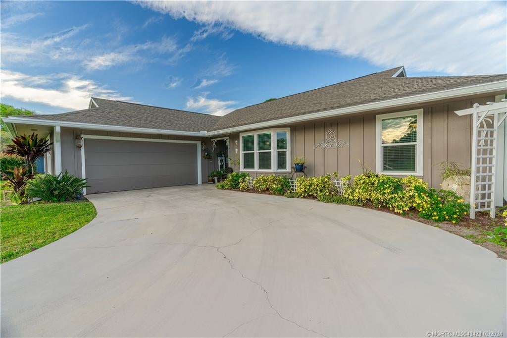 Photo of 7875 SE Trenton Avenue, Hobe Sound, FL 33455 (MLS # M20043423)