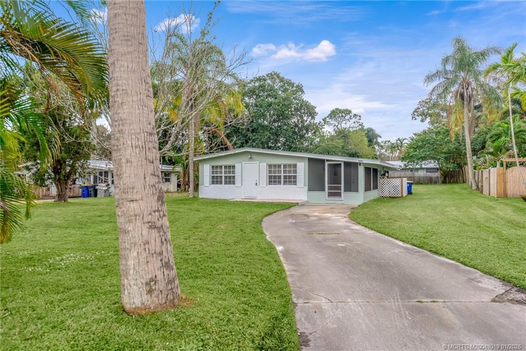 Photo of 1048 SW 30th Street, Palm City, FL 34990 (MLS # M20048019)