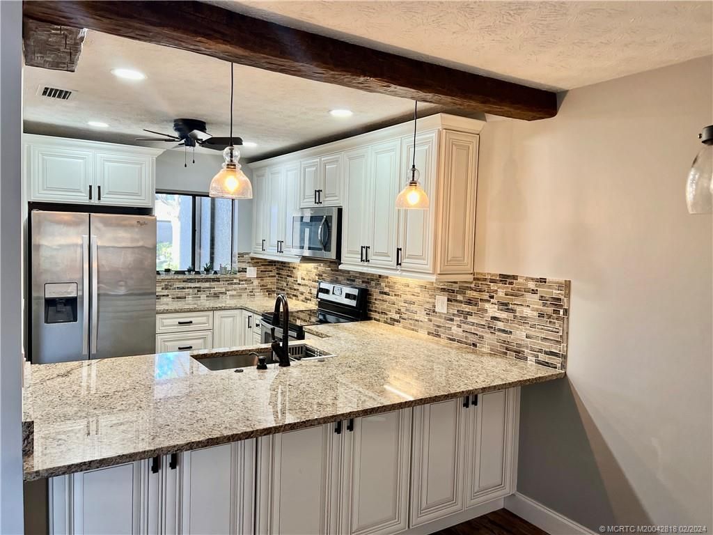 Photo of 1578 SW Crossing Circle, Palm City, FL 34990 (MLS # M20042818)