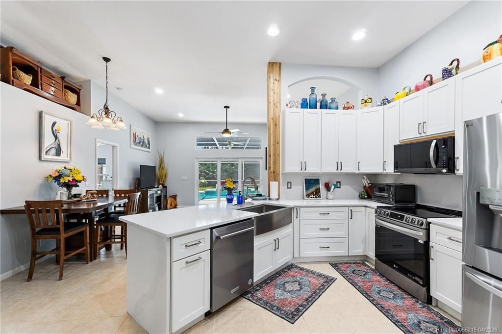 Photo of 8577 SW Sea Captain Drive, Stuart, FL 34997 (MLS # M20055215)