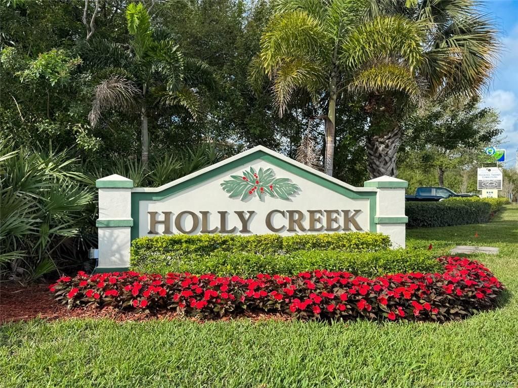 Photo of 655 NE Wax Myrtle Way, Jensen Beach, FL 34957 (MLS # M20043678)