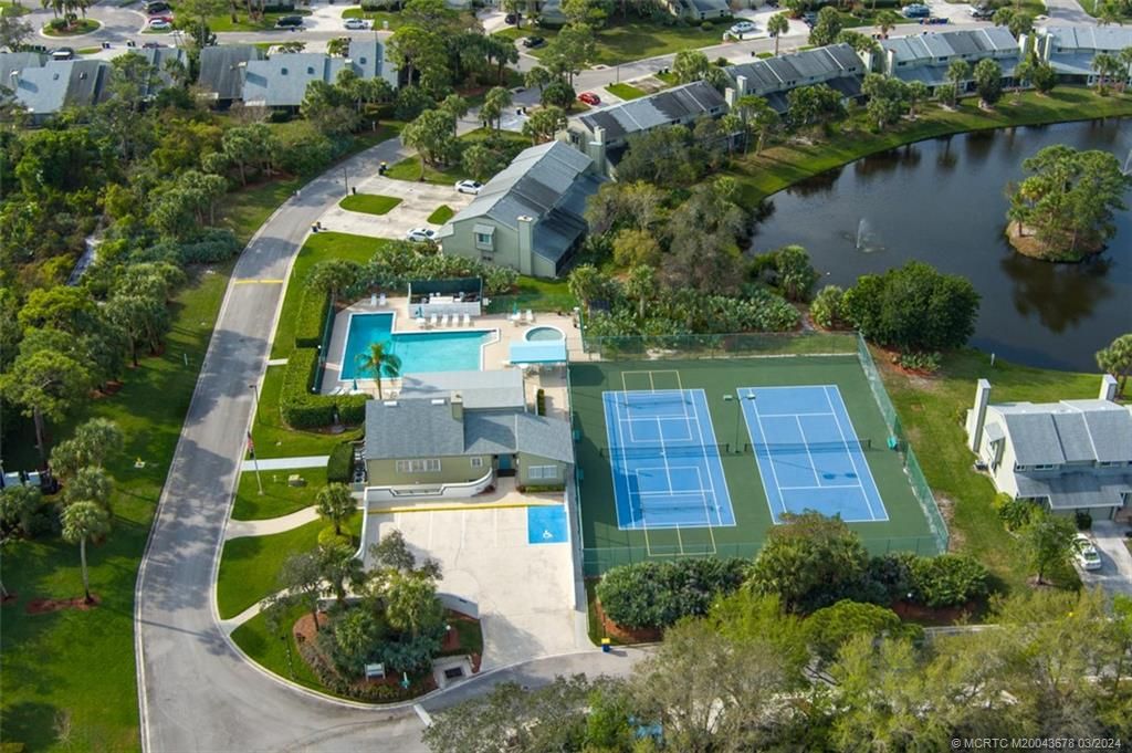 Photo of 655 NE Wax Myrtle Way, Jensen Beach, FL 34957 (MLS # M20043678)