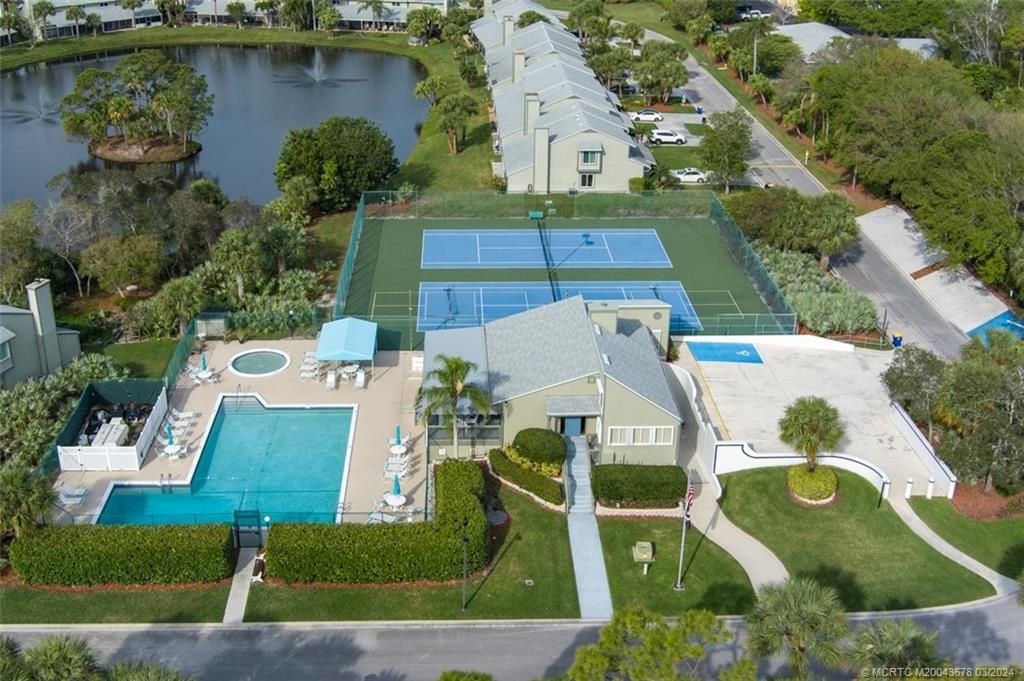 Photo of 655 NE Wax Myrtle Way, Jensen Beach, FL 34957 (MLS # M20043678)