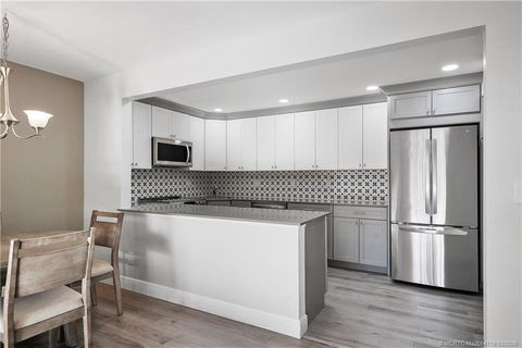 Photo of 1935 SW Silver Pine Way #B1, Palm City, FL 34990 (MLS # M20054719)