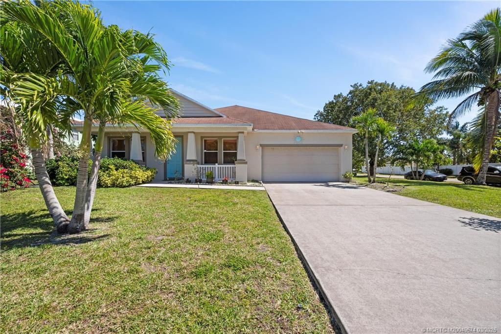 Photo of 3591 SW Dellamano Street, Port Saint Lucie, FL 34953 (MLS # M20049574)
