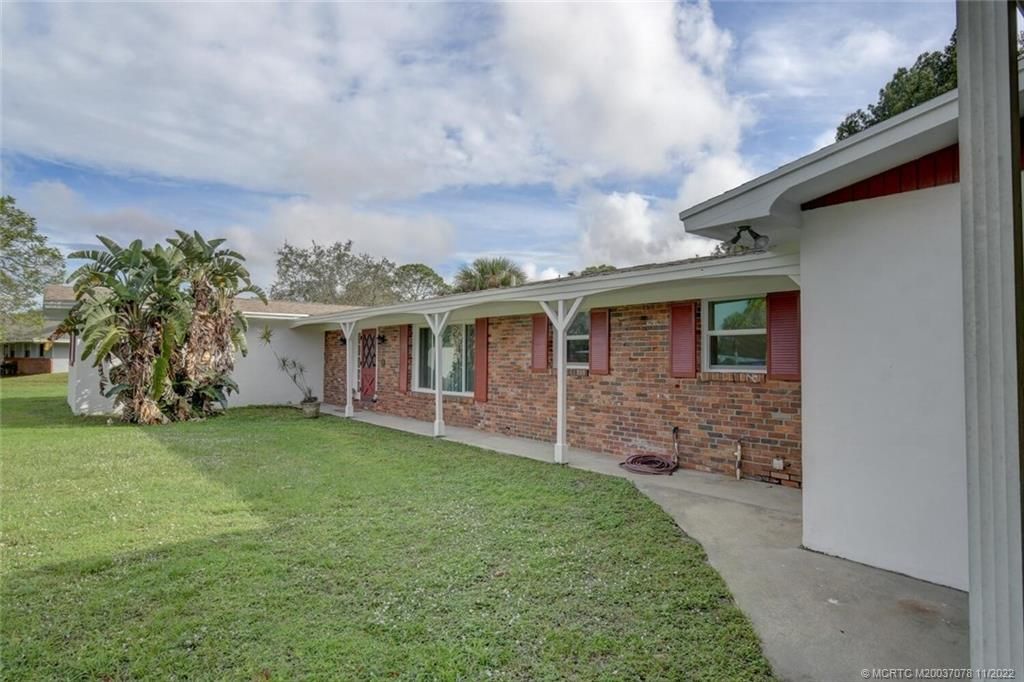 Photo of 5727 Briargate Lane, Fort Pierce, FL 34981 (MLS # M20037078)