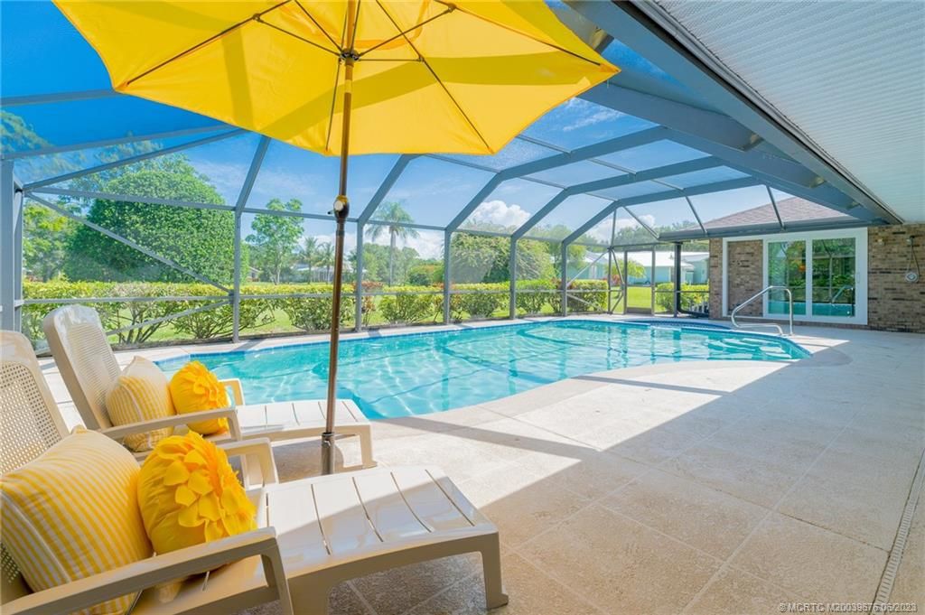 Photo of 2154 NE Chestnut Court, Jensen Beach, FL 34957 (MLS # M20039676)