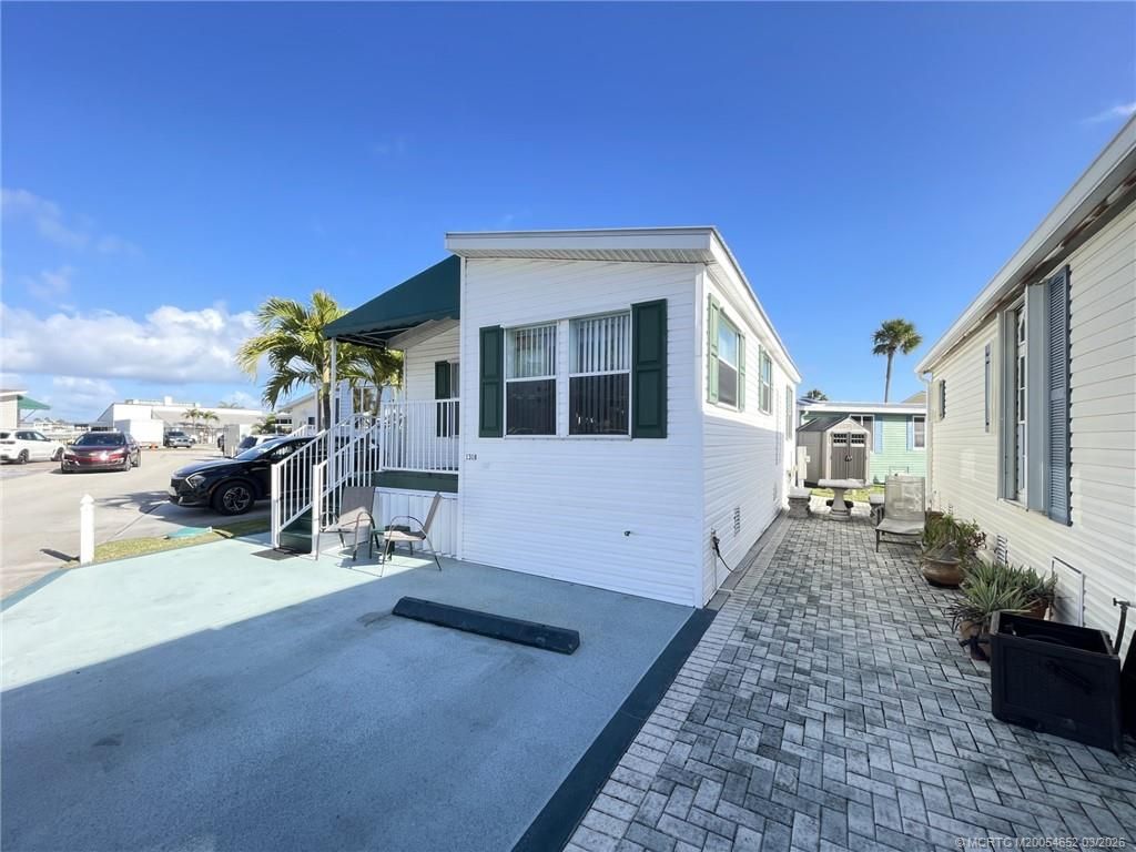 Photo of 1318 Nettles Boulevard, Jensen Beach, FL 34957 (MLS # M20054652)