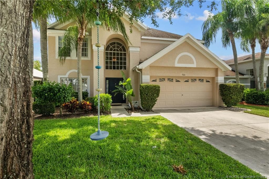 Photo of 704 NW Waterlily Place, Jensen Beach, FL 34957 (MLS # M20040518)