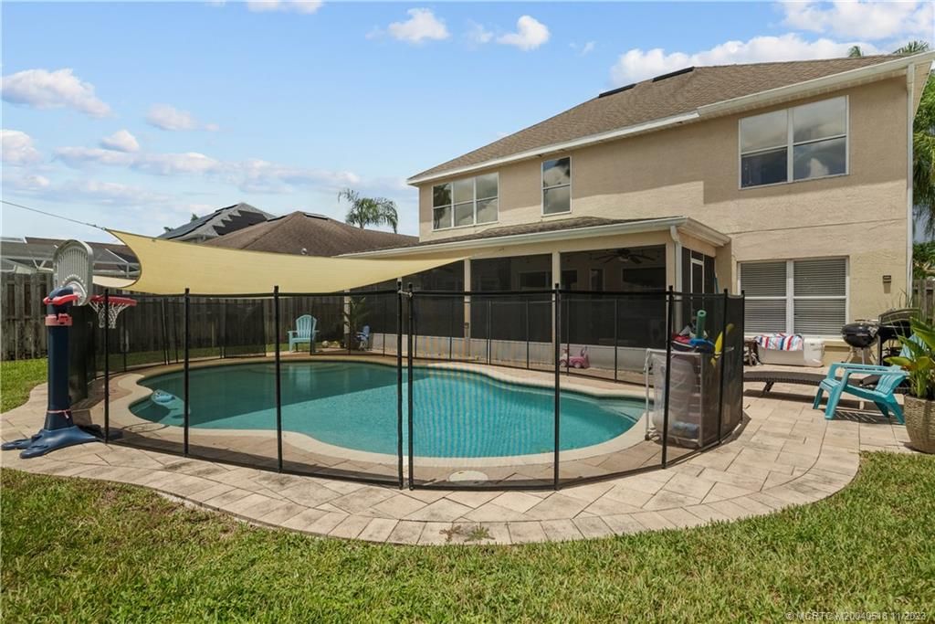 Photo of 704 NW Waterlily Place, Jensen Beach, FL 34957 (MLS # M20040518)